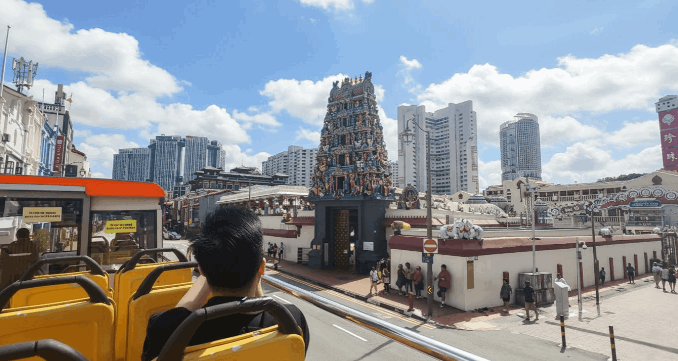 View of Sri Veeramakaliamman Temple in Little India from the FunVee open-top bus during an SG Culture Pass heritage tour in Singapore.