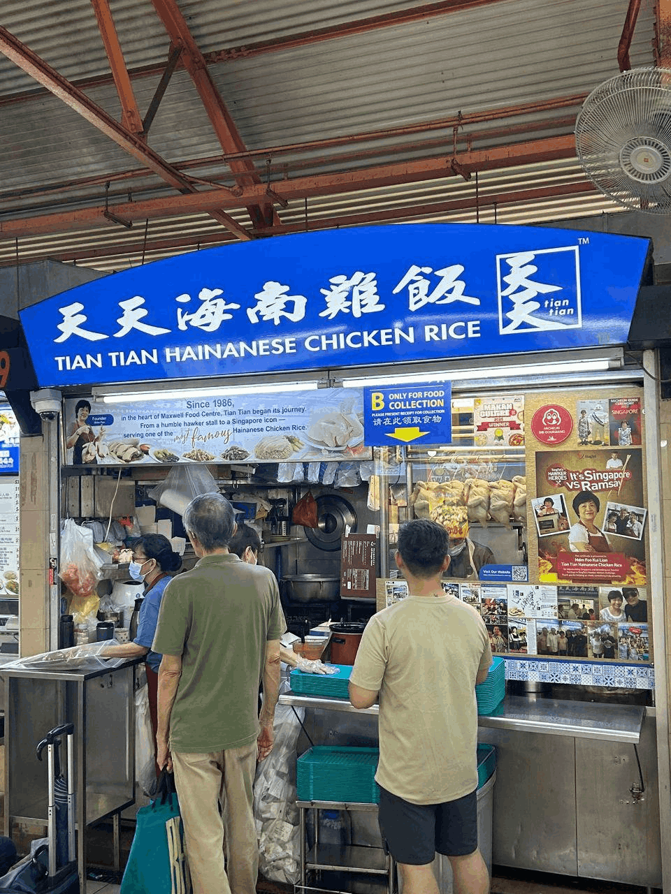 Customers queuing at Tian Tian Hainanese Chicken Rice stall in Maxwell Food Centre, Singapore, famous for its tender chicken and fragrant rice.